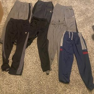 7 pairs of boys pants size 8